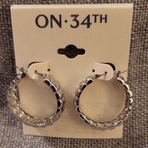 On 34th Silver Scalloped Hoop Earrings.